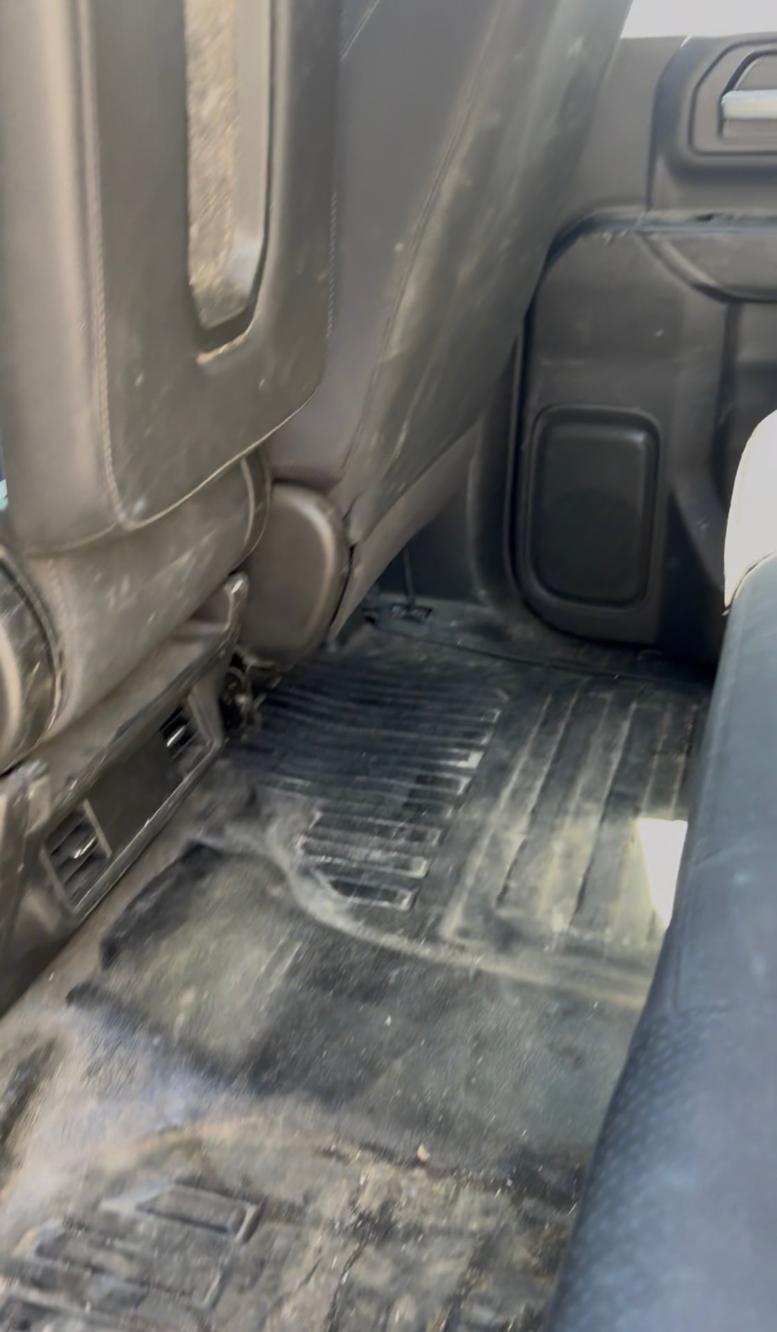 Truck floor and carpet before professional detailing